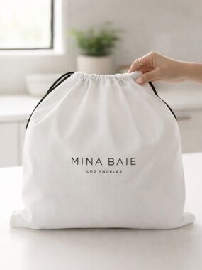 NWOT MINA BAIE White Dust Bag Drawstring Storage Pouch Designer Logo